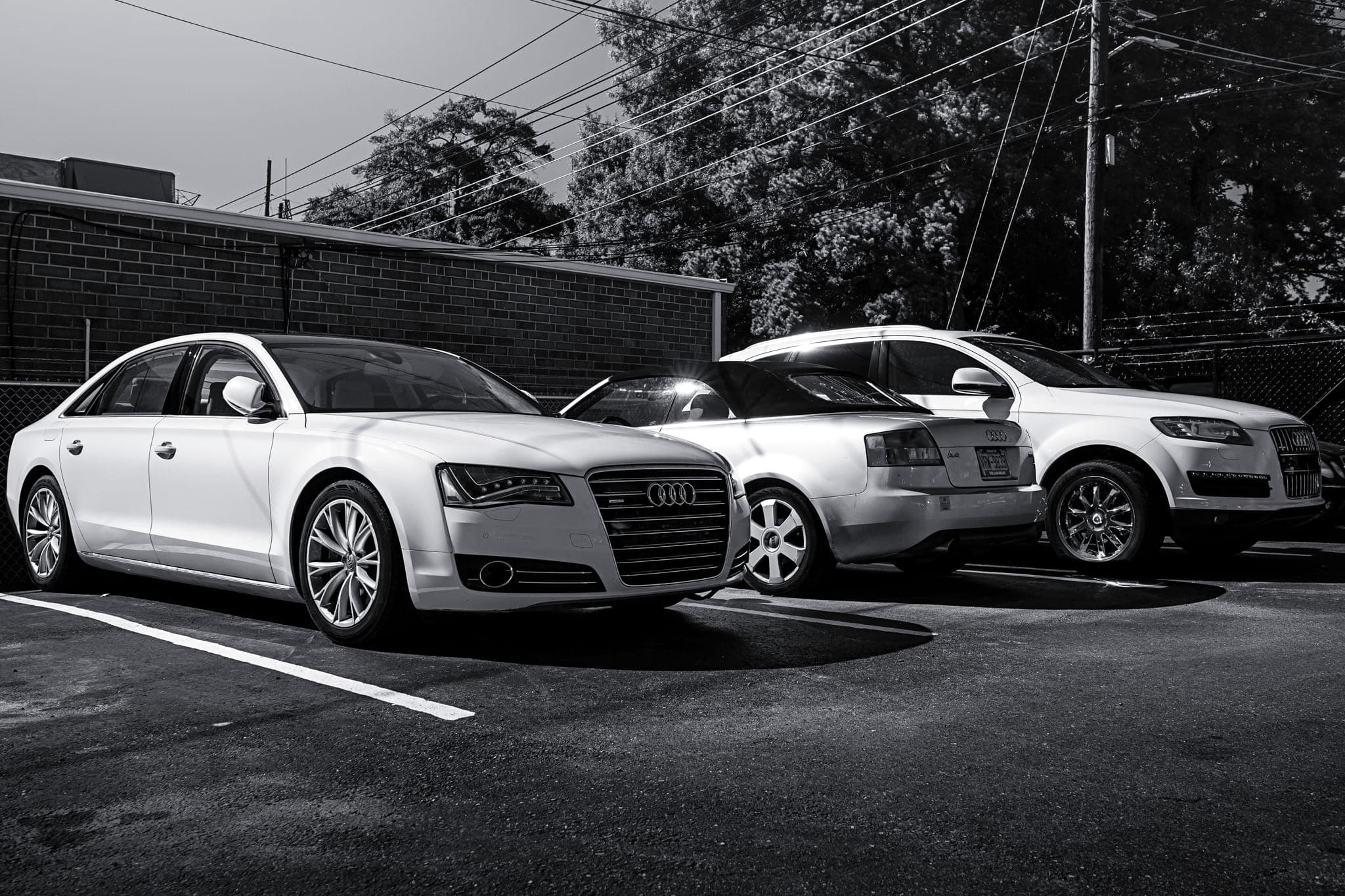 Three Audis, including an R8, outside the Eurowise shop