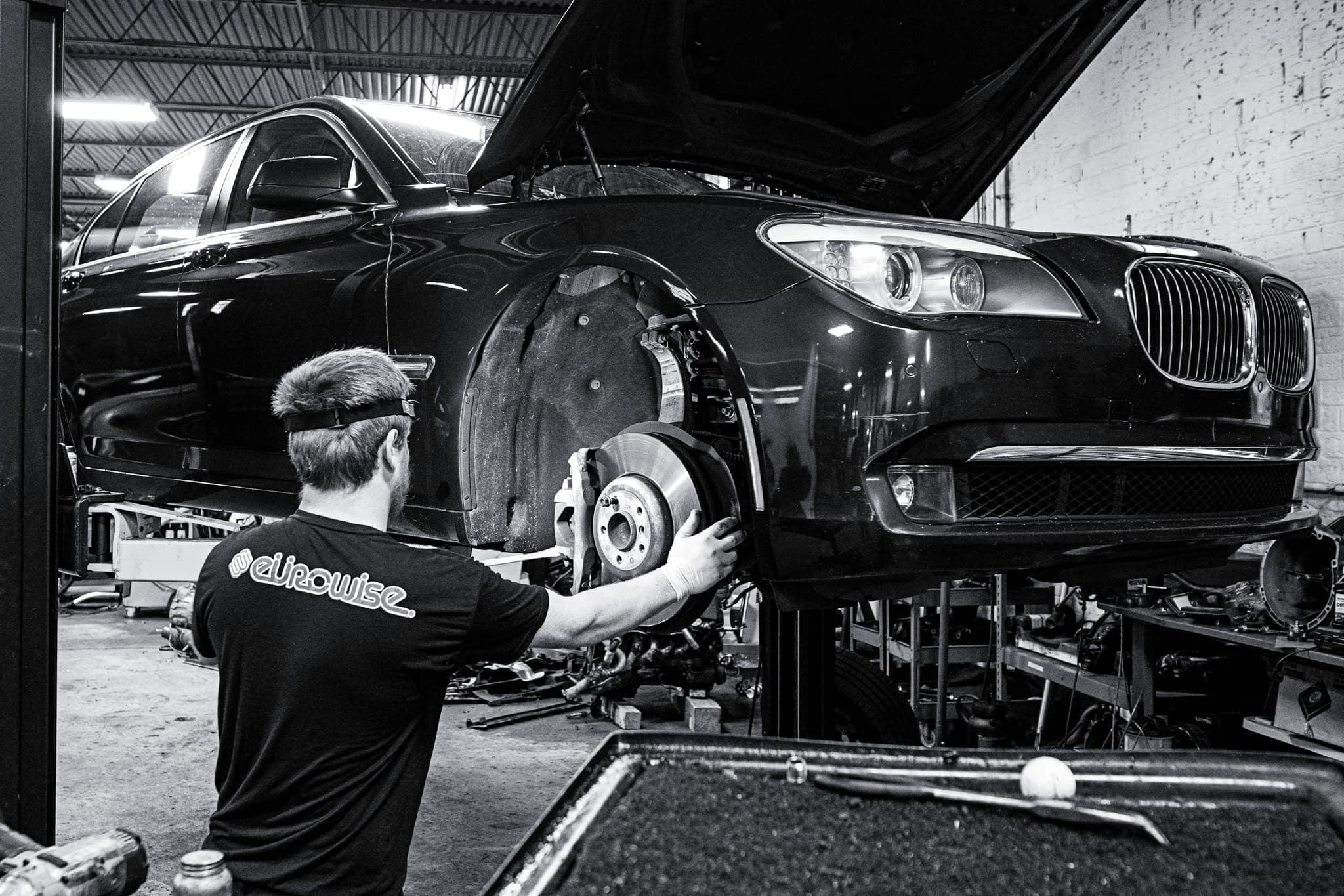 A BMW 750Li on the lift at Eurowise