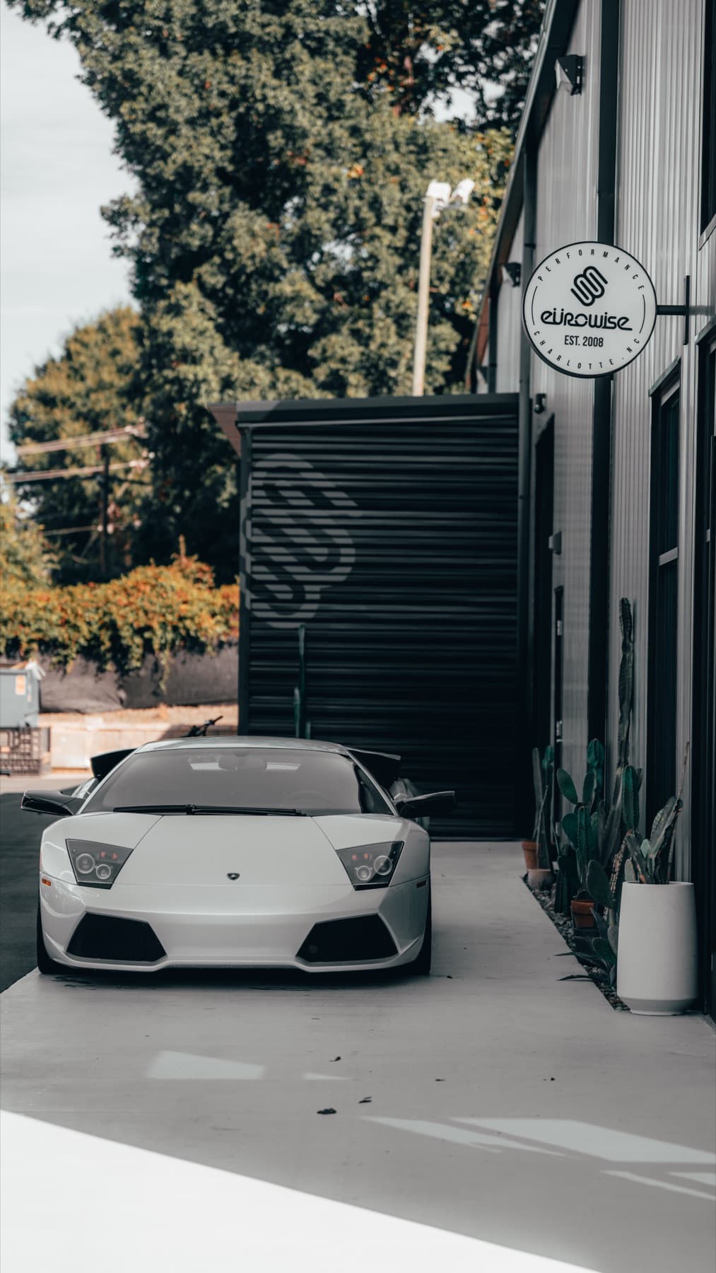 White Ferrari outside the Eurowise building