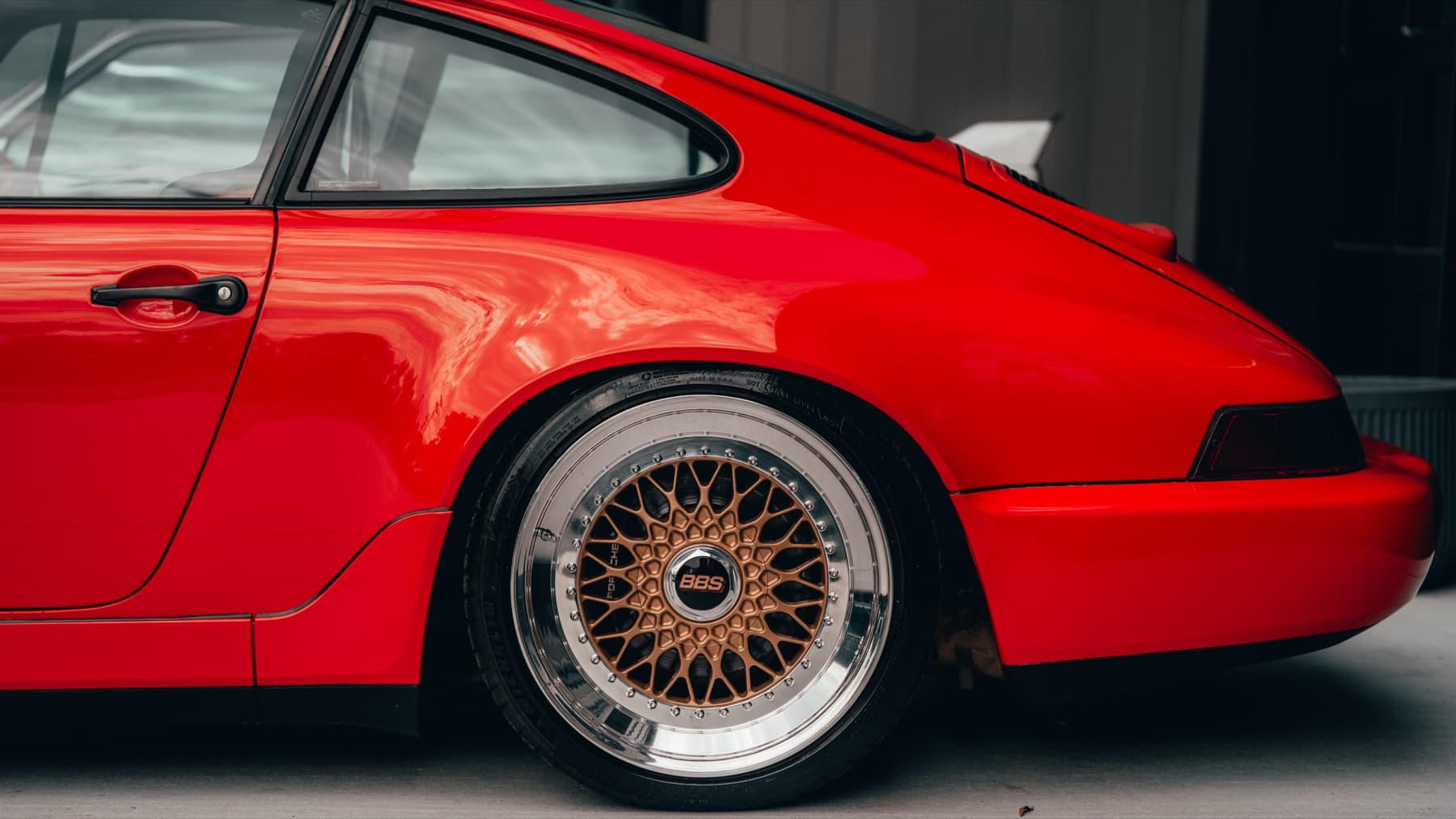 Orange classic Porsche 911 in profile