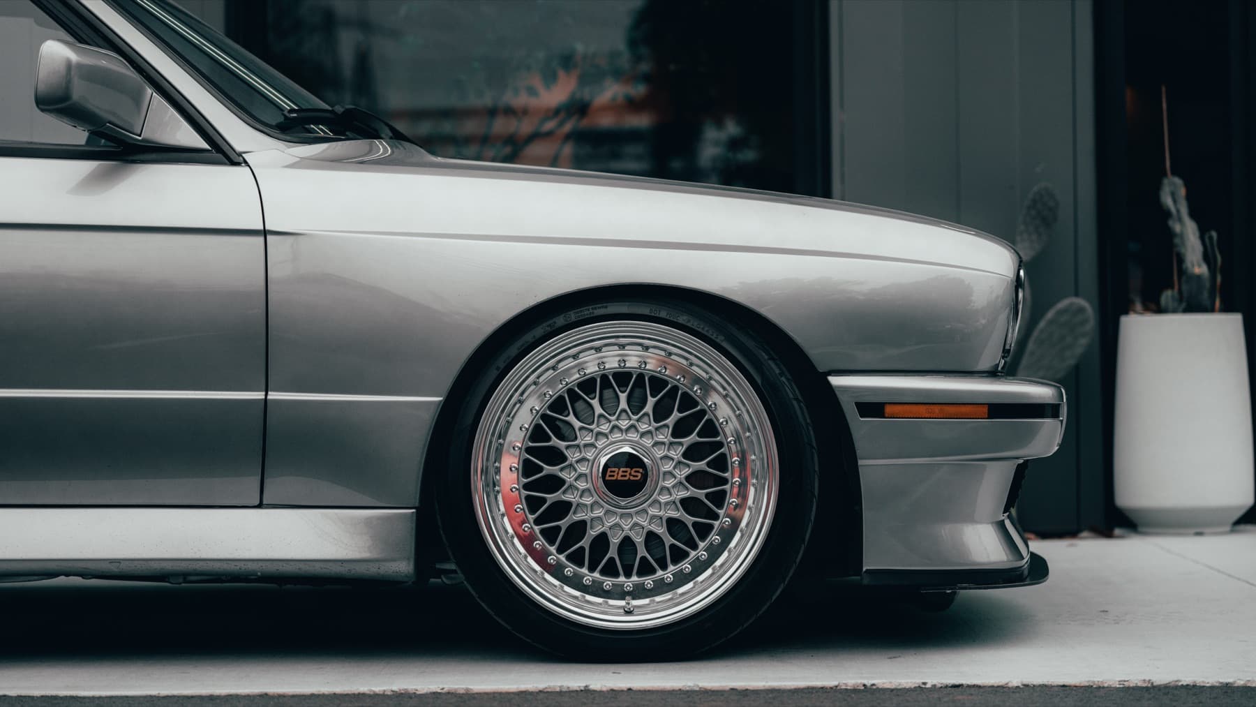 Wheel detail on a silver BMW E30 M3