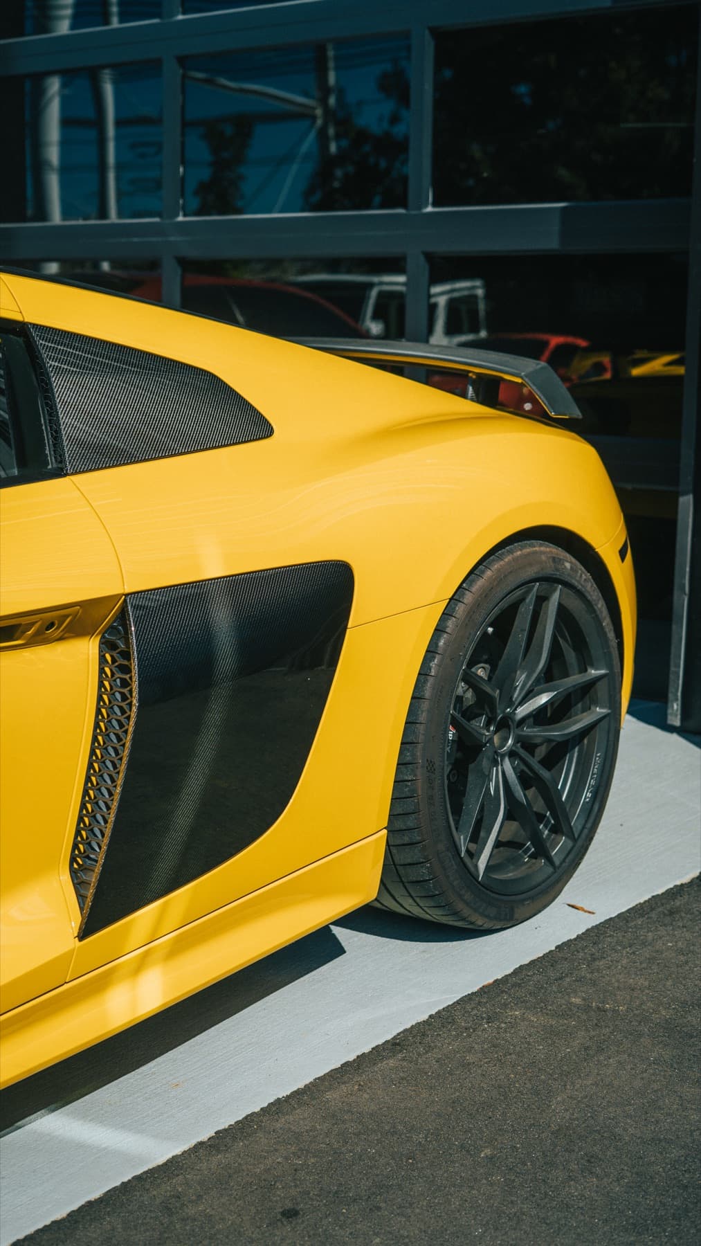 Side intake detail on a yellow Audi R8