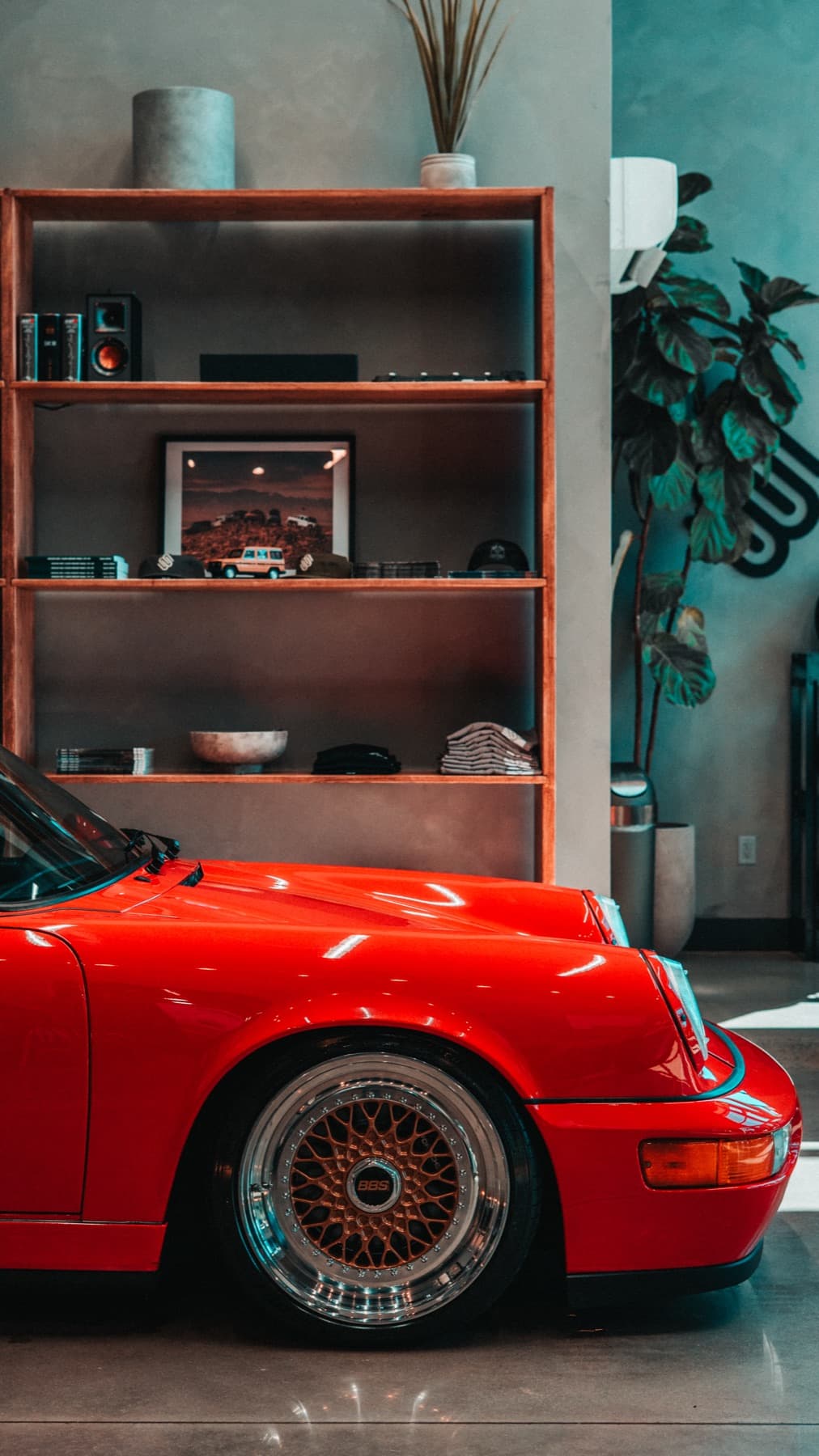 Orange classic Porsche 911 in the showroom