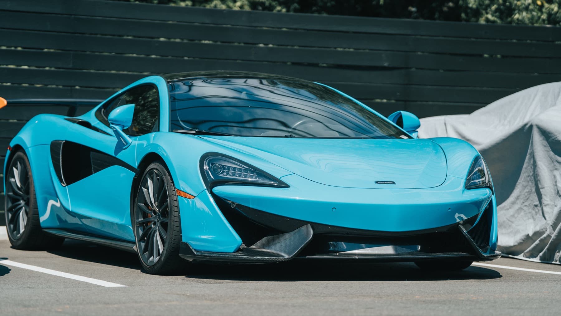 Light blue McLaren 570S in profile