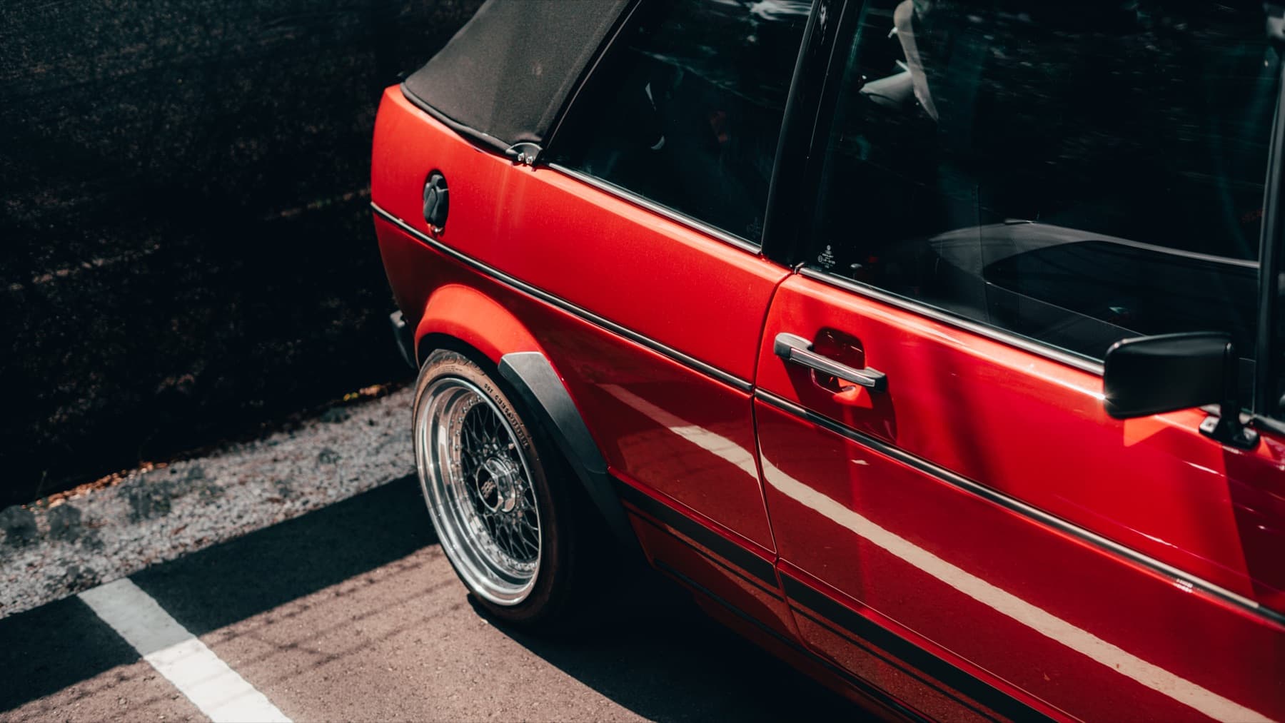 Red classic Volkswagen in profile