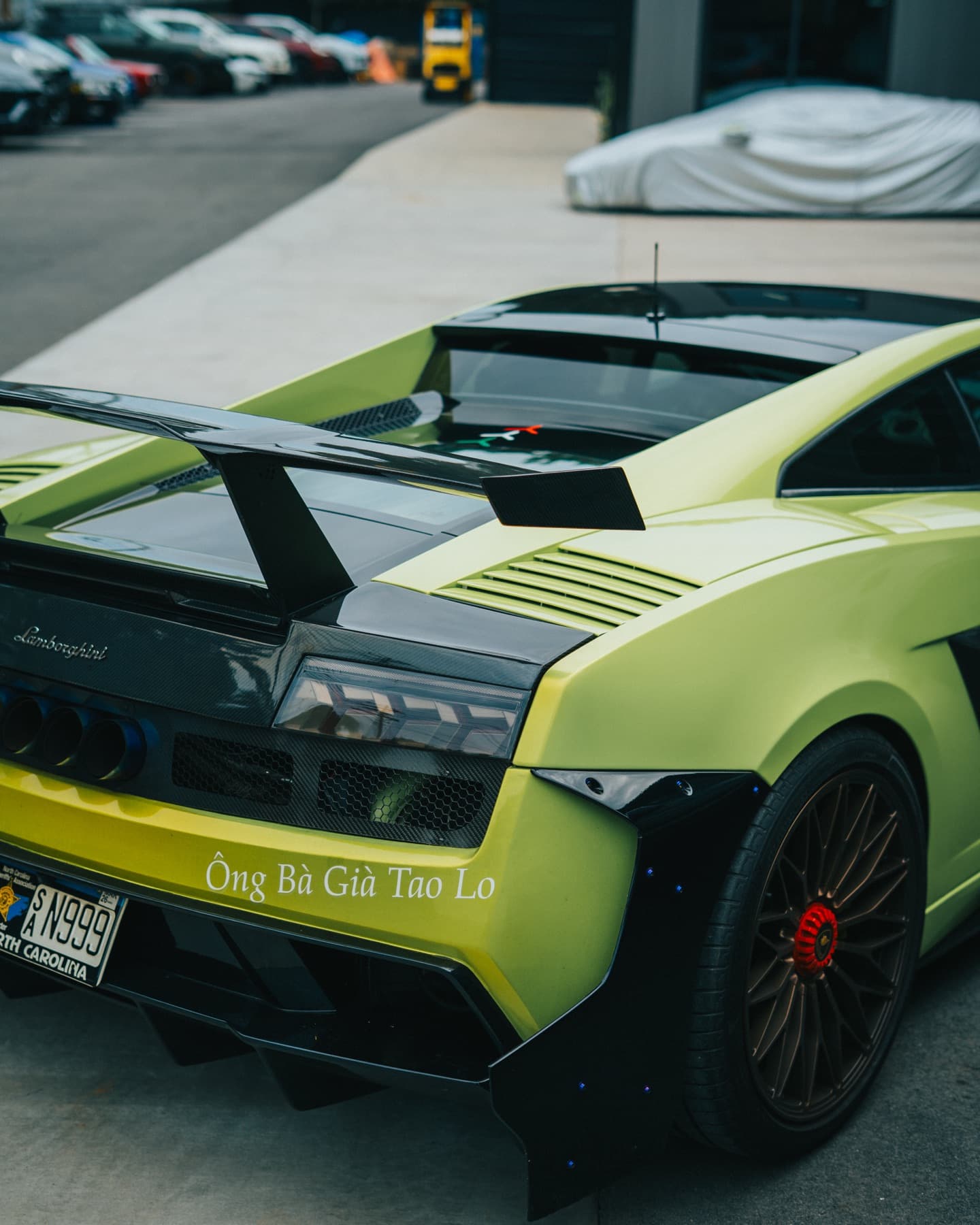 Rear of a lime green Lamborghini Huracán Performante