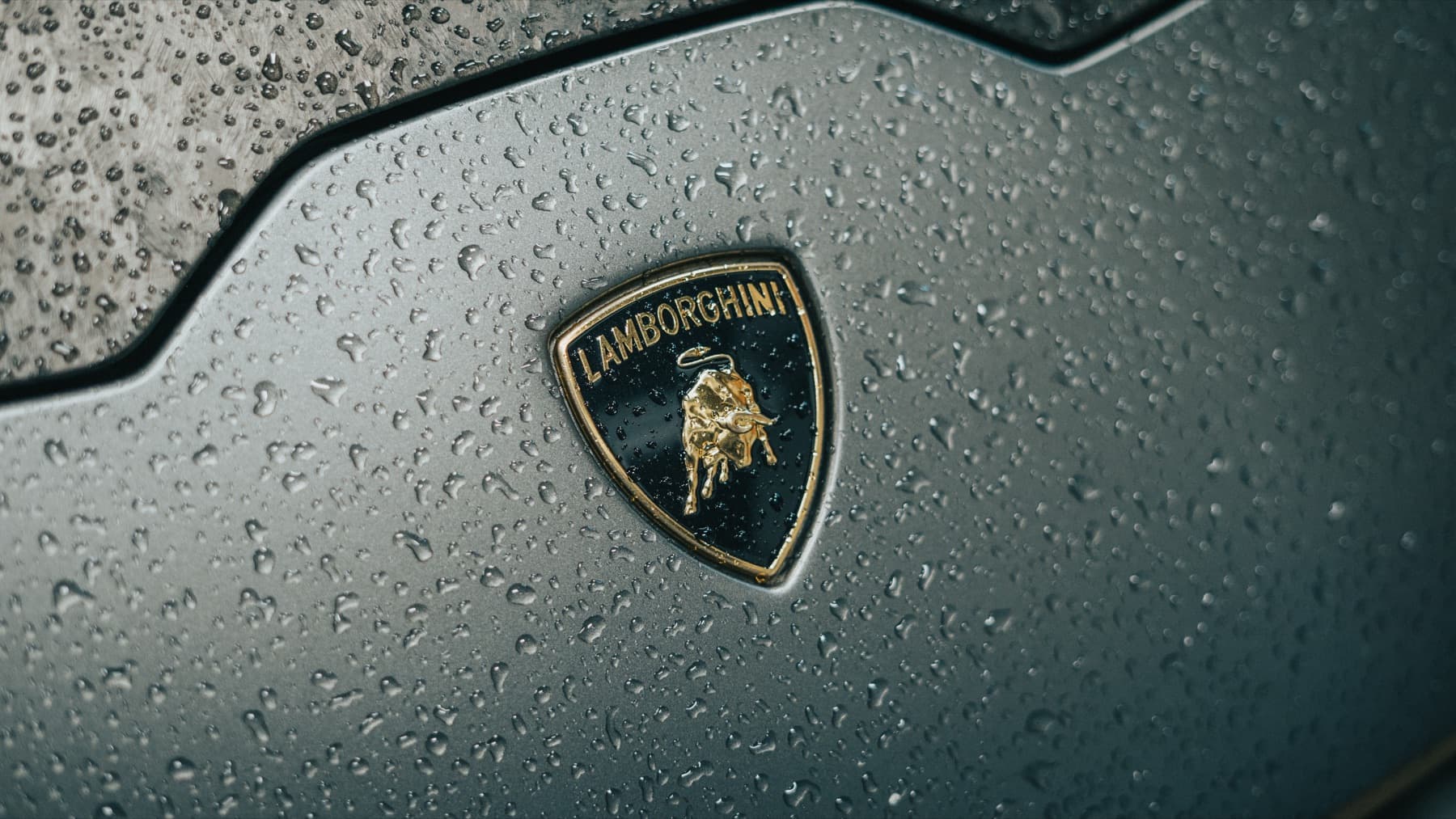 Lamborghini badge beaded with water