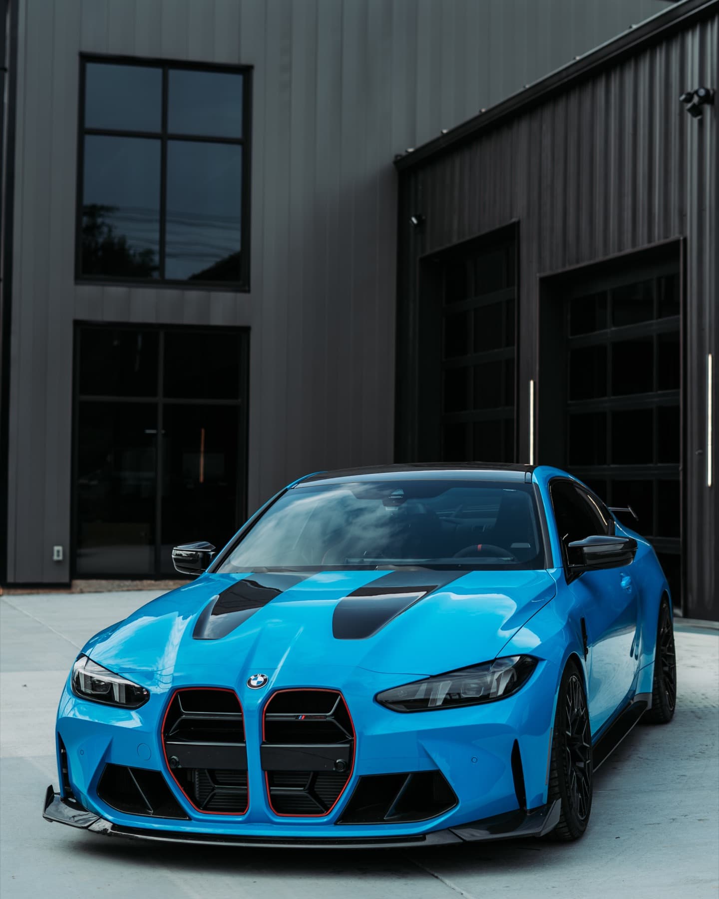 Front of a blue BMW M4