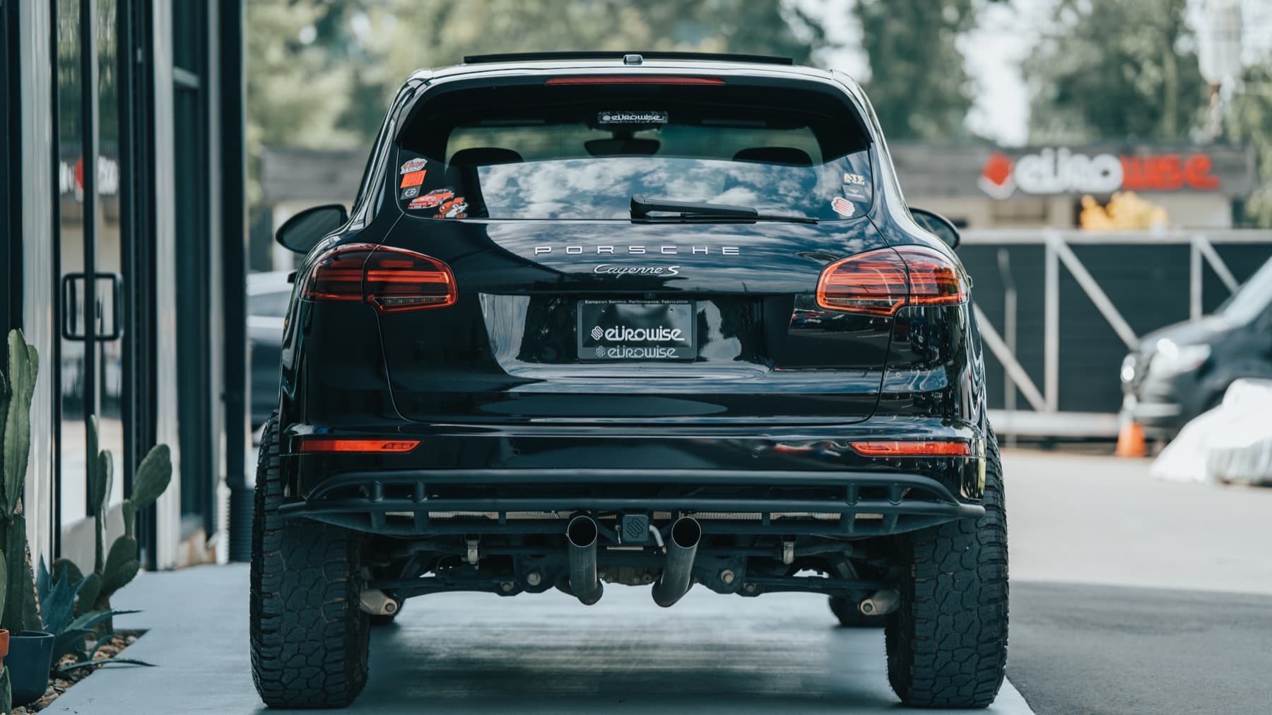 Rear of a black Porsche Cayenne off-road build