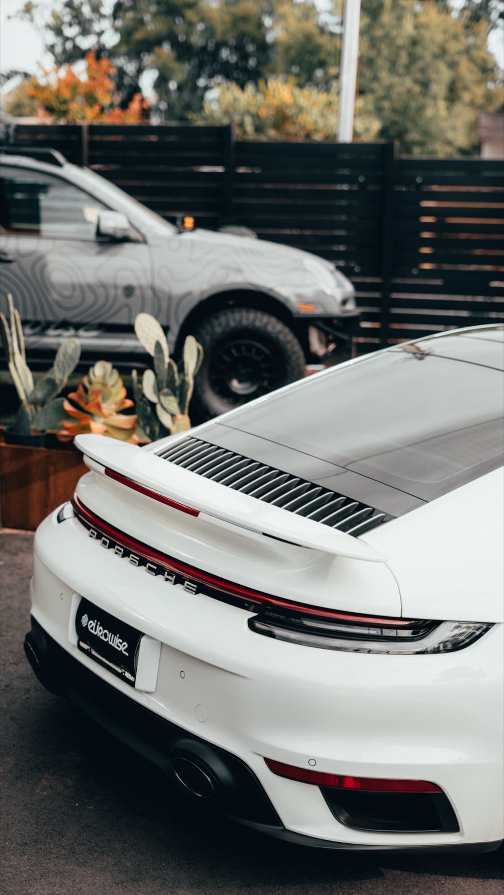 Rear of a white Porsche 911