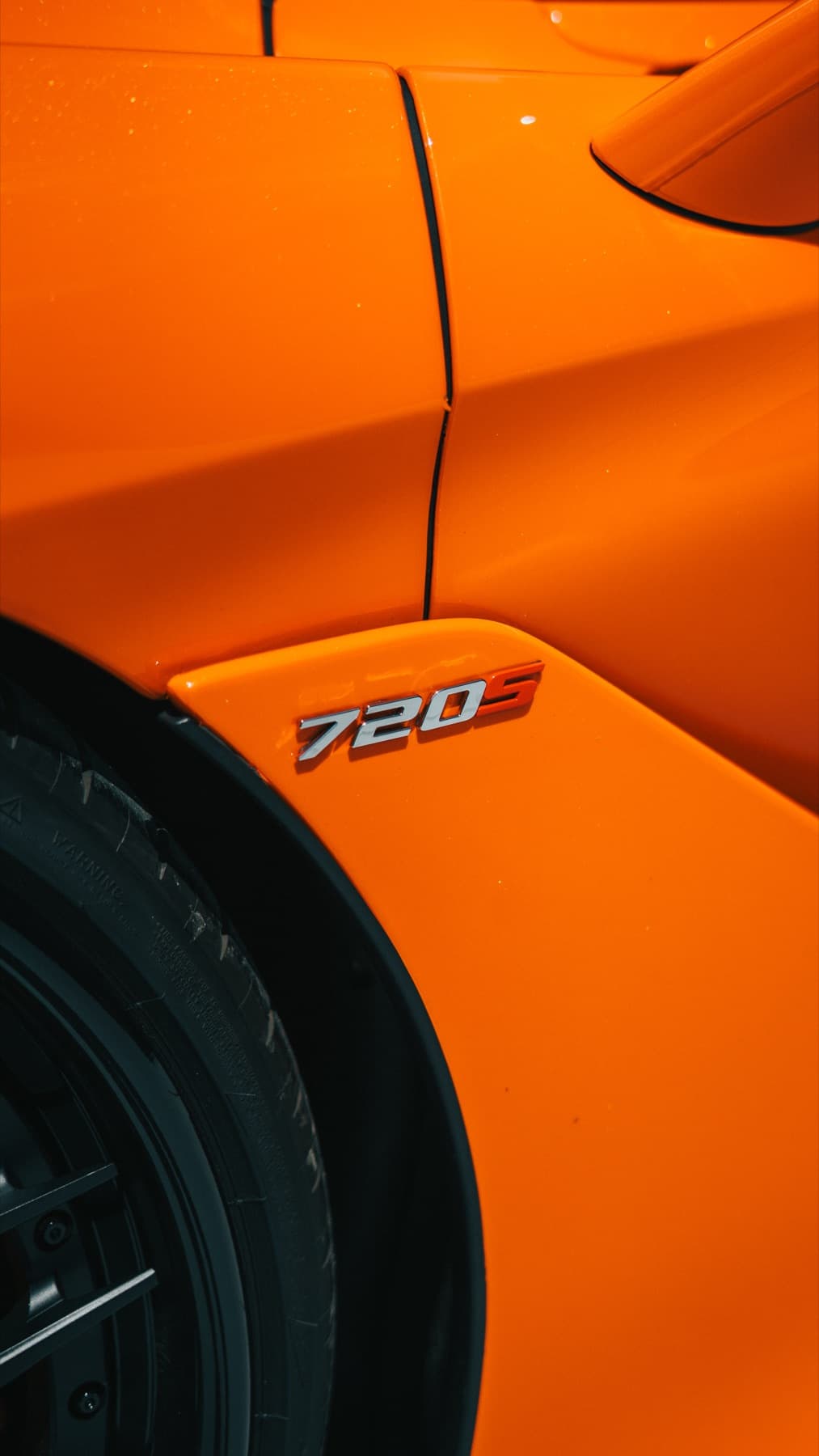 Side detail on an orange McLaren 720S