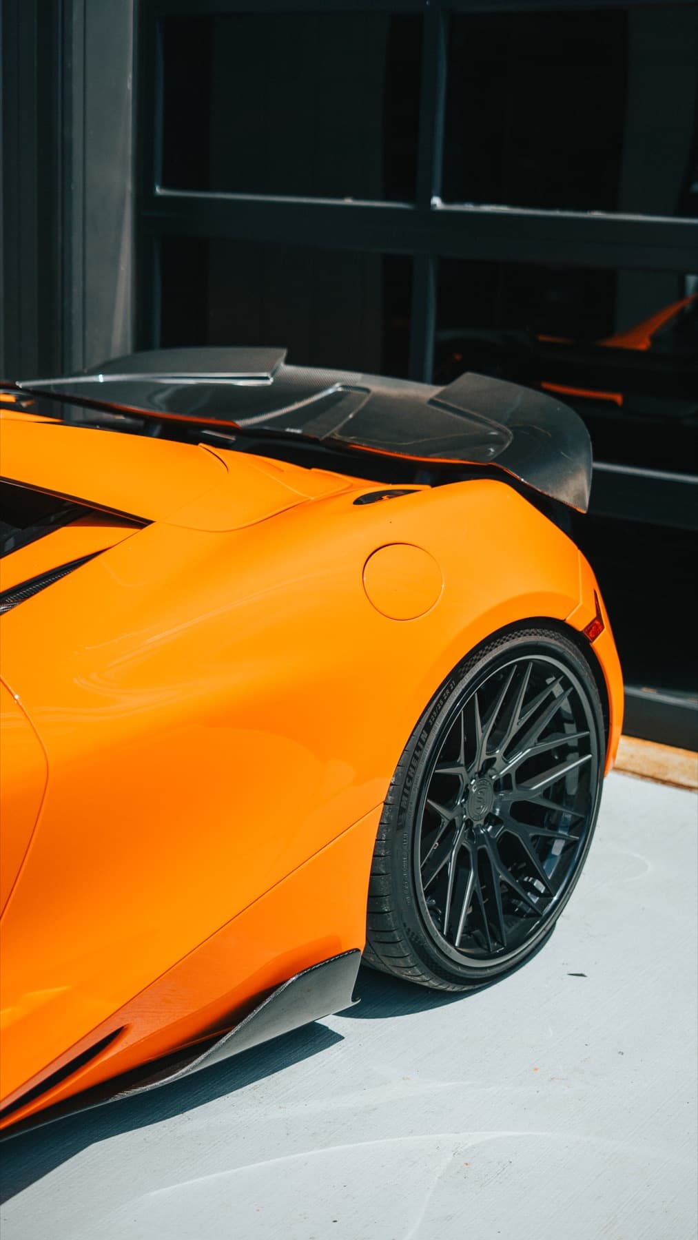 Rear of an orange McLaren 720S