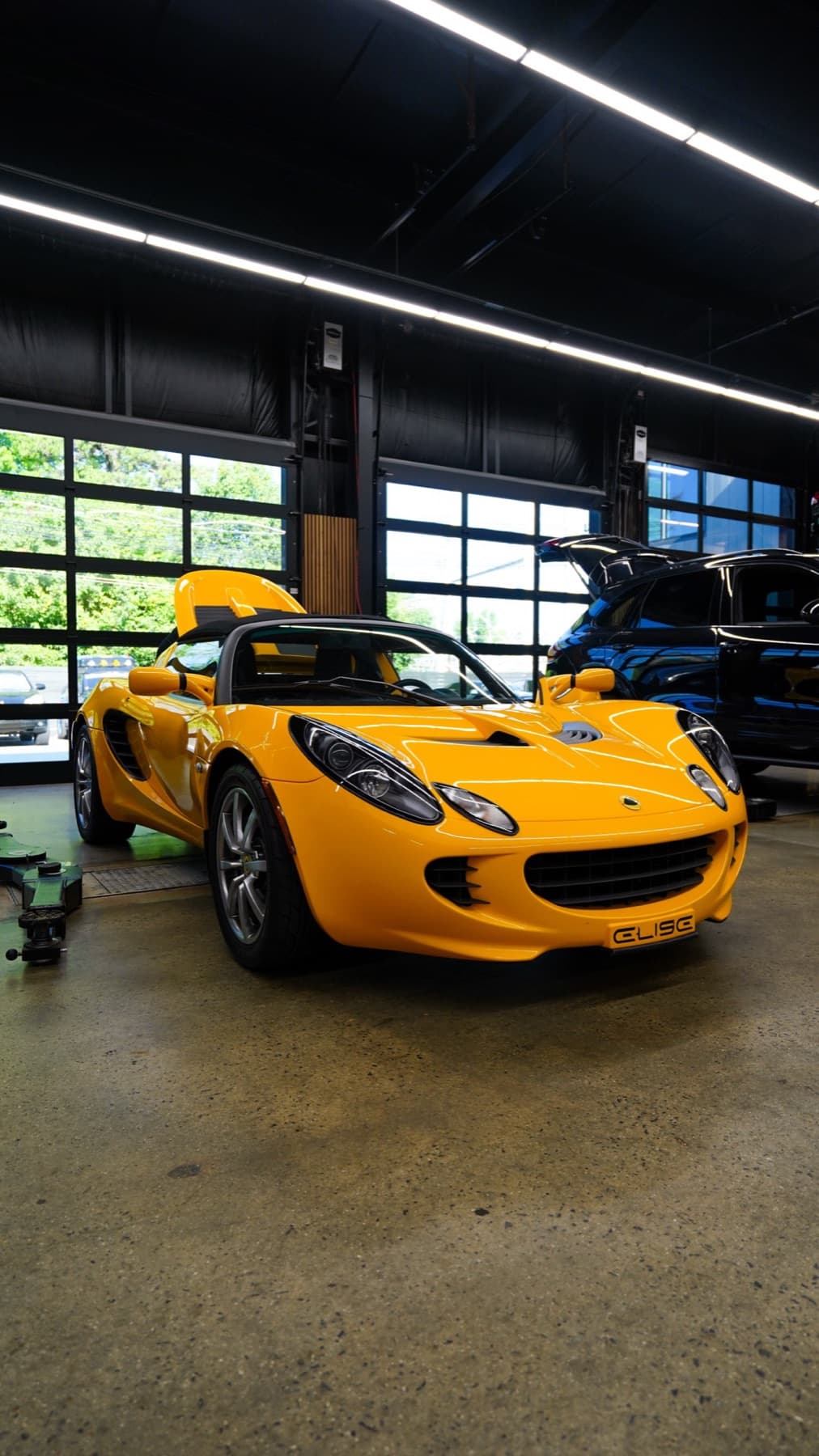 Yellow Lotus Elise in the shop