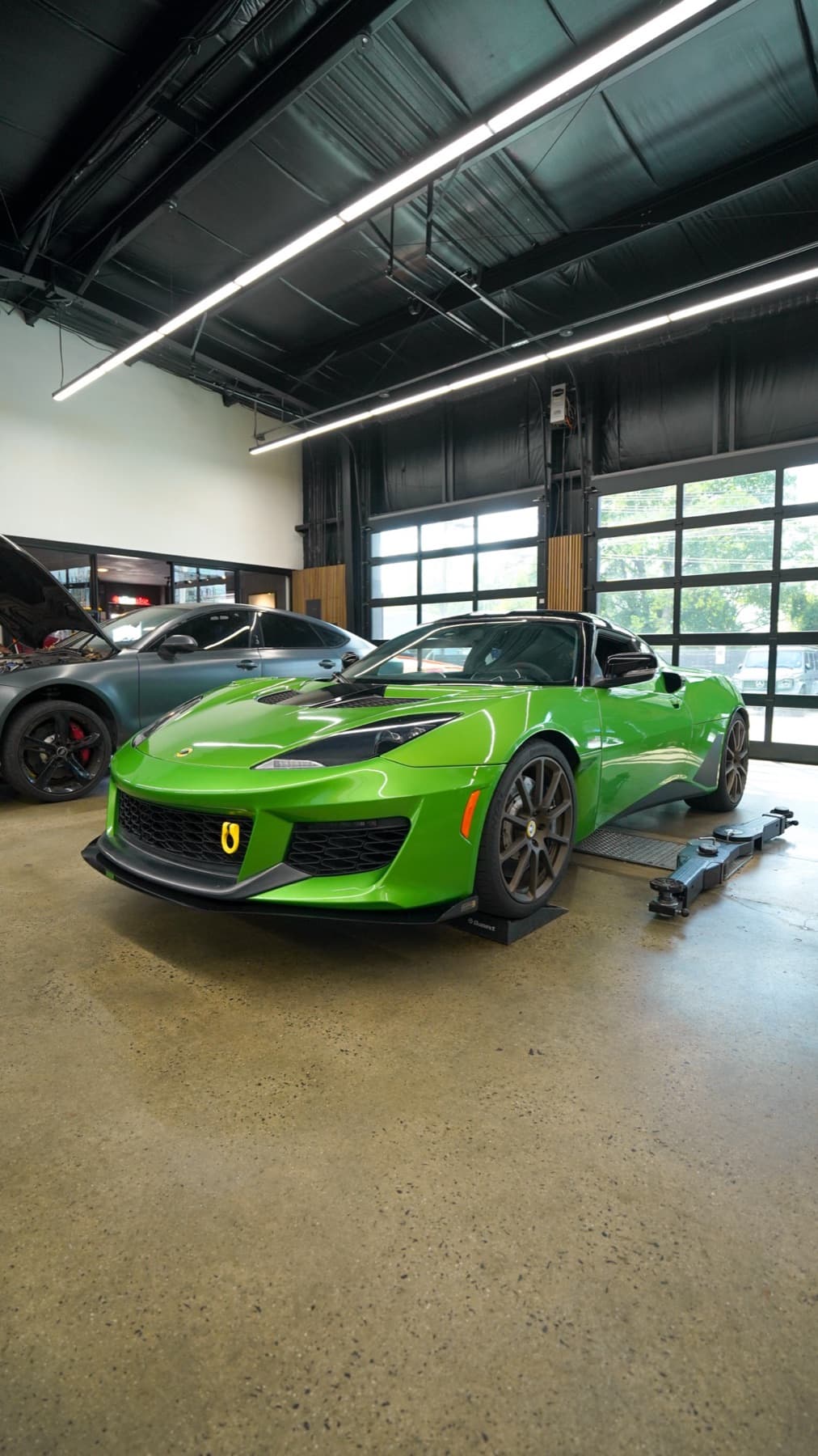 Lime green sports car in the shop