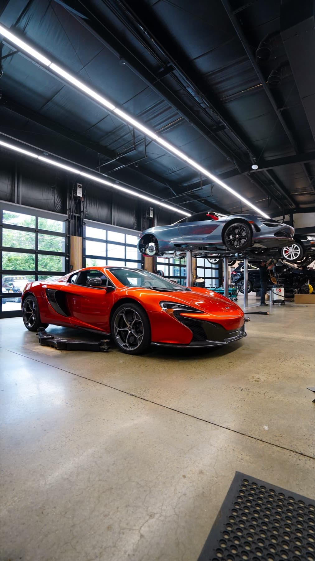 Orange McLaren on the shop floor