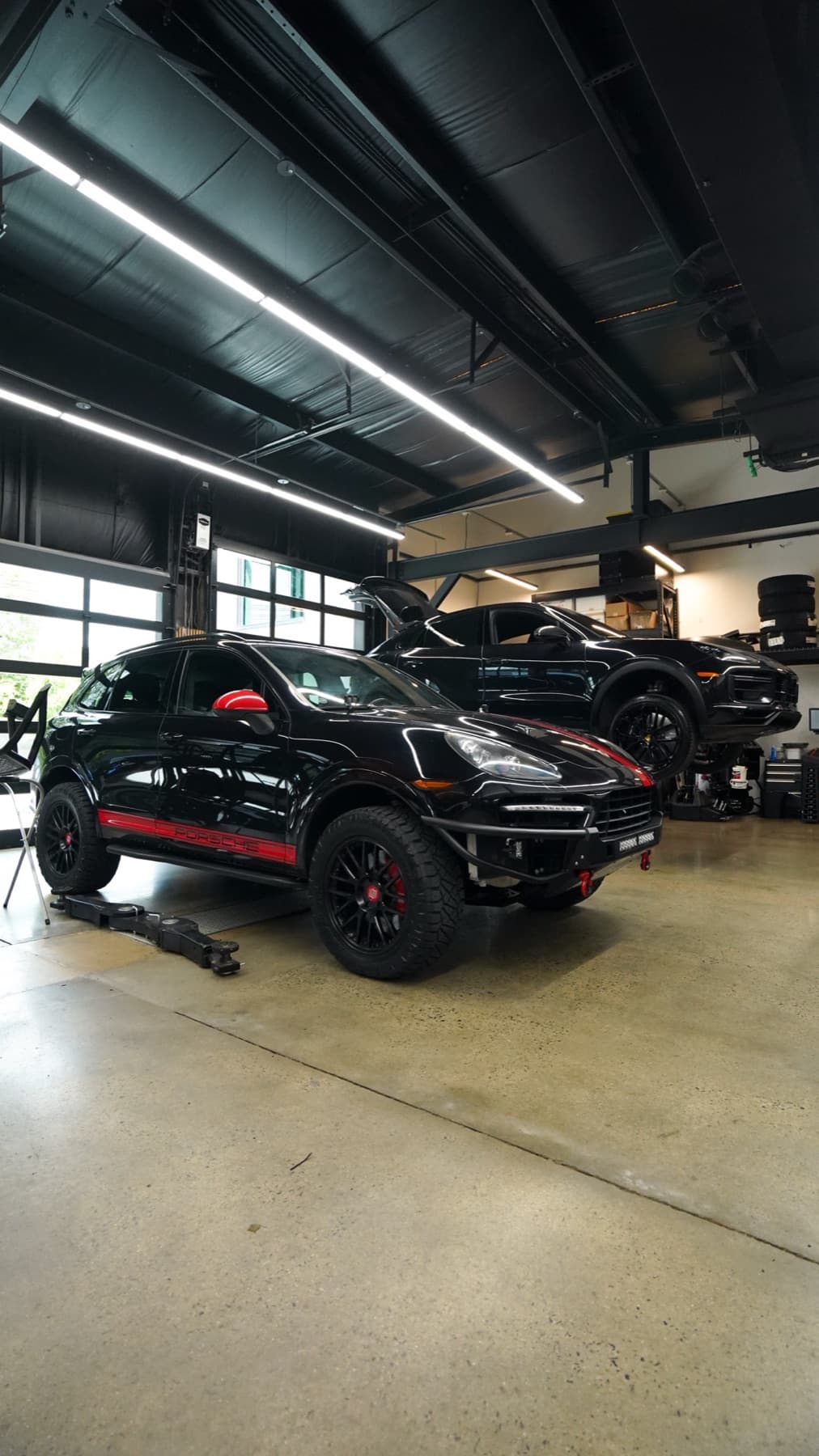 Black SUV in the service bays